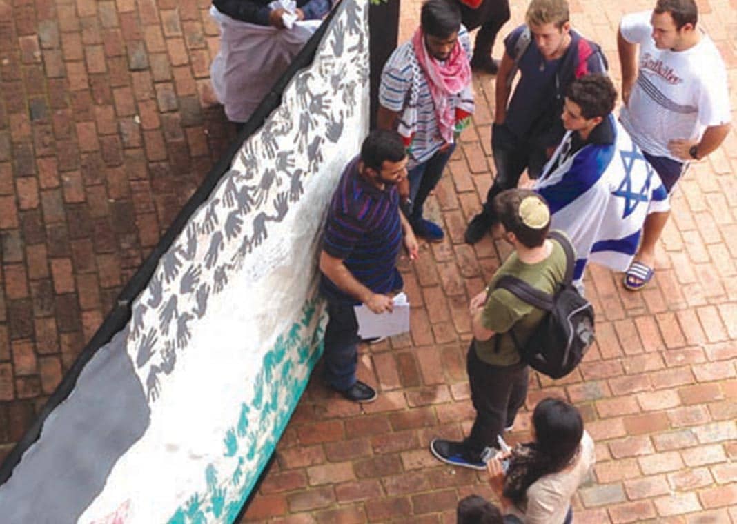 Israeli and Palestinian flags at a campus demonstration: